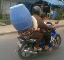 funny-motorcycle-helmet-barrel.jpg